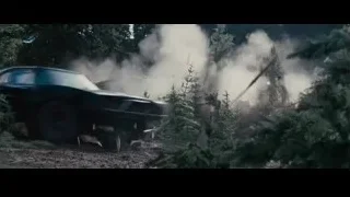 destroyed blue sports car in forested area — Furious Seven