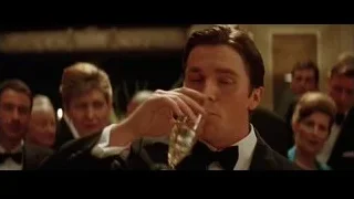 man in tuxedo drinking from glass — Batman