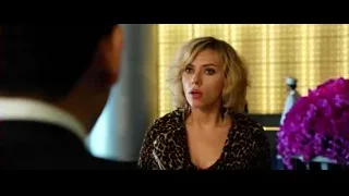 woman in leopard print blouse with man — Lucy
