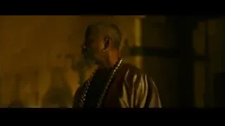 man in robe in dimly lit room — Gladiator 2