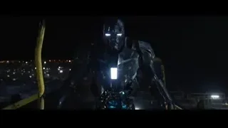 robot on rooftop at night — Iron Man 3