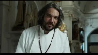 man in priest robe in church — Life of Pi