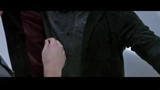 man with hand on chin wearing dark jacket — Now You See Me 2