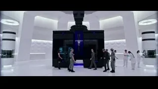 group of people walking in futuristic control room — Now You See Me 2