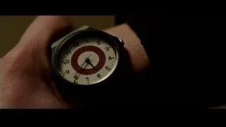 close-up of wristwatch on person's wrist — Now You See Me 2