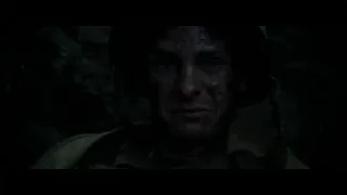 Man in helmet with dirty face in cave — Hacksaw Ridge