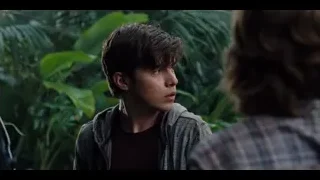 young man in jungle-like environment — Jurassic World