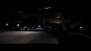 Dark underground parking garage at night — Batman: The Dark Knight Rises