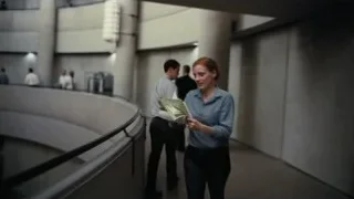 person walking down spiral staircase — Interstellar
