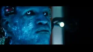Man with glowing blue eyes and robotic head — The Amazing Spider Man 2