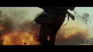 soldier with explosion in background — Hacksaw Ridge