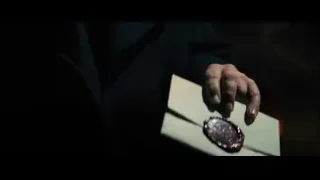 hand on paper with liquid — John Wick: Chapter 4