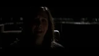 Woman's face with serious expression in dark room — Batman: The Dark Knight
