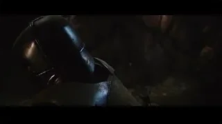 person in helmet and armor with sword — Iron Man