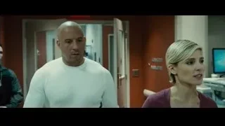 bald man and woman walking in hospital — Furious Seven