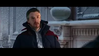 man in red hood jacket by stone building — Spiderman: No Way Home