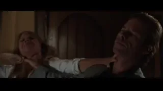 Man and woman in dim room — Iron Man 3