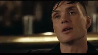 Young man smiling in dimly lit bar — Peaky Blinders