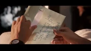 Hands holding a handwritten note — Jobs