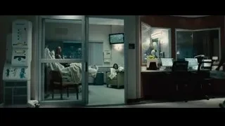 Patient on bed in dimly lit hospital room — Furious Seven