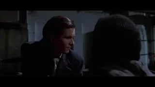 man sitting deep in thought in dark room — American Psycho