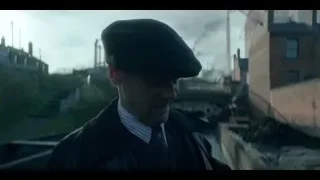 Two men in black coats by canal — Peaky Blinders
