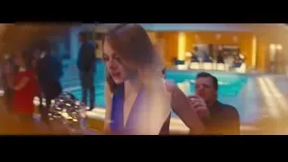 people dancing on stage in dimly lit room — La La Land