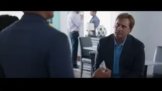 two men talking in office — The Big Short