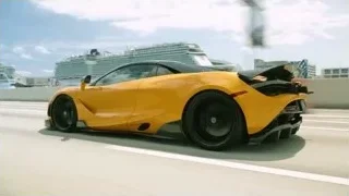 yellow sports car on race track with cruise ship — Sports Cars