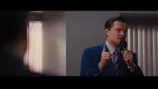 man in suit giving speech — The Wolf Of Wall Street