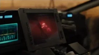 Tablet displaying waveform in industrial setting — Blade Runner 2049