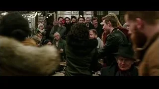 people in crowded outdoor market with lights — Now You See Me 2