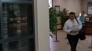man and woman in an office — Breaking Bad