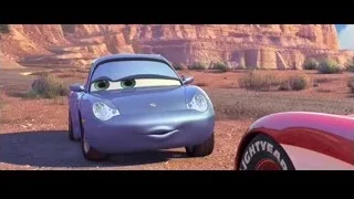 blue Porsche driving on desert dirt road — Cars
