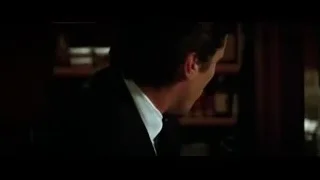 young man holding knife in dimly lit room — Batman: The Dark Knight