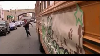 man running by yellow school bus — Spider Man