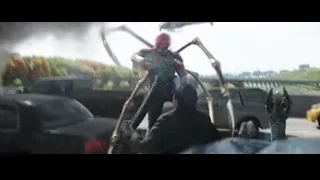 man cleaning truck, person in red suit — Spiderman: No Way Home