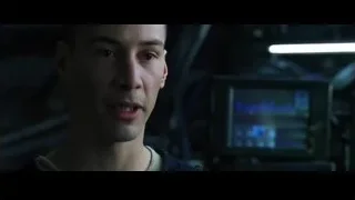 bald man looking at computer monitor — The Matrix