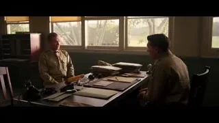 Two men in khaki uniforms at office desk — Hacksaw Ridge