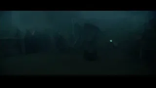 Hooded figure in dark eerie setting — Harry Potter and the Goblet of Fire