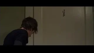 hand opening white door with key — The Amazing Spider Man