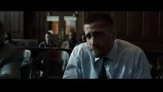 man sitting at table in courtroom — Southpaw