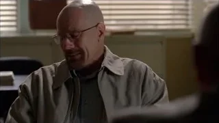 bald man sitting at desk deep in thought — Breaking Bad
