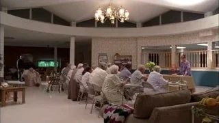 Elderly man in wheelchair holding bell — Breaking Bad