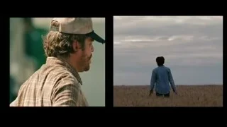 man in plaid shirt in wheat field — Into the Wild