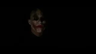 clown villain face in the dark — Batman: The Dark Knight