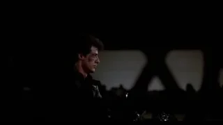 person riding motorcycle at night — Rocky III