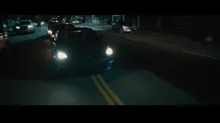 Black sports car driving at night — Furious Seven