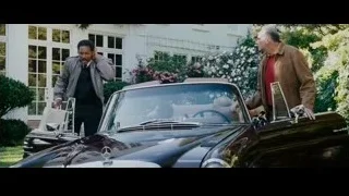 two men next to black convertible car — The Persuit of Happyness