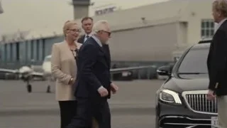 Elderly man in suit walking in hallway — Succession